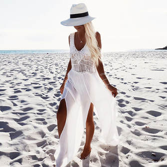 Girl Wearing white dress on sand